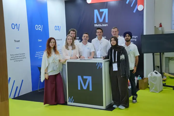 MetisJean at AI Everything Abu Dhabi: the team behind the counter of the stand